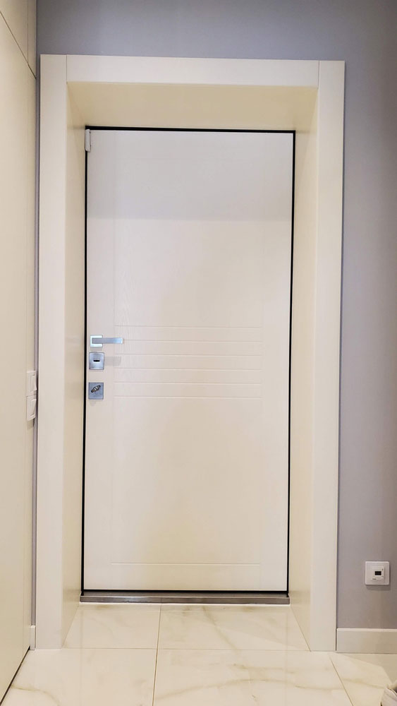 Changement d'une porte par une porte en alu blindée en rénovation
